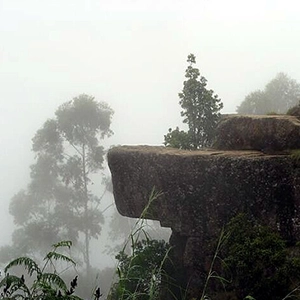 Enjoy sweeping Nilgiri views and unique rock formations at Dolphin’s Nose near De Castle Villa, Coonoor