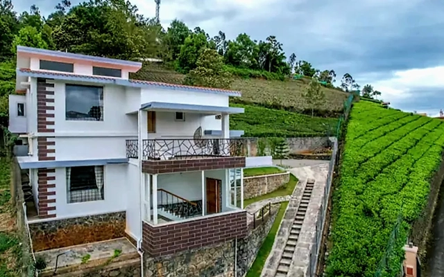 Book your stay at Greendale Kotagiri for a peaceful retreat with scenic views and comfortable rooms