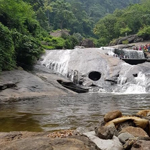 Take a refreshing dip at Kovai Kutralam Falls near Farmhouse, Sulur, for nature lovers and visitors.