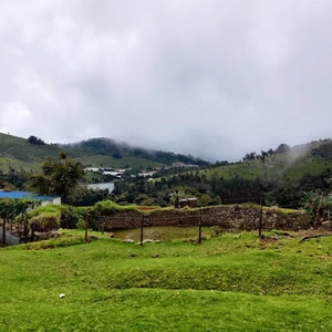Enjoy peaceful dam views and scenery at Kunjapanai Viewpoint close to our welcoming resort in Kotagiri.