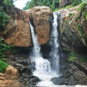 Enjoy the fresh mist and soothing sounds of Law Falls when you stay at Chalet Mon Ami Resort Kotagiri.
