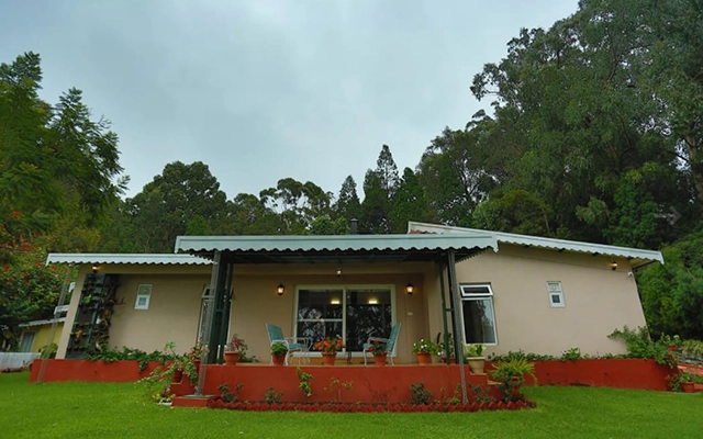 Book a stay at Rayne Forest Kotagiri with luxury rooms mountain views and premium amenities