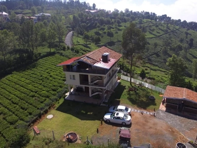 Book corporate retreat villas in Coonoor with scenic mountain views and premium group stay facilities