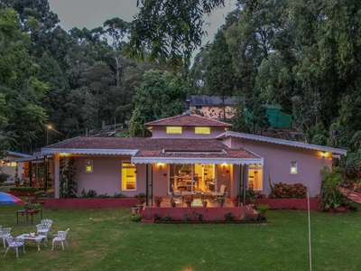 Fort-inspired space offering spacious bedrooms, pristine baths, and scenic mountain views in Kotagiri.