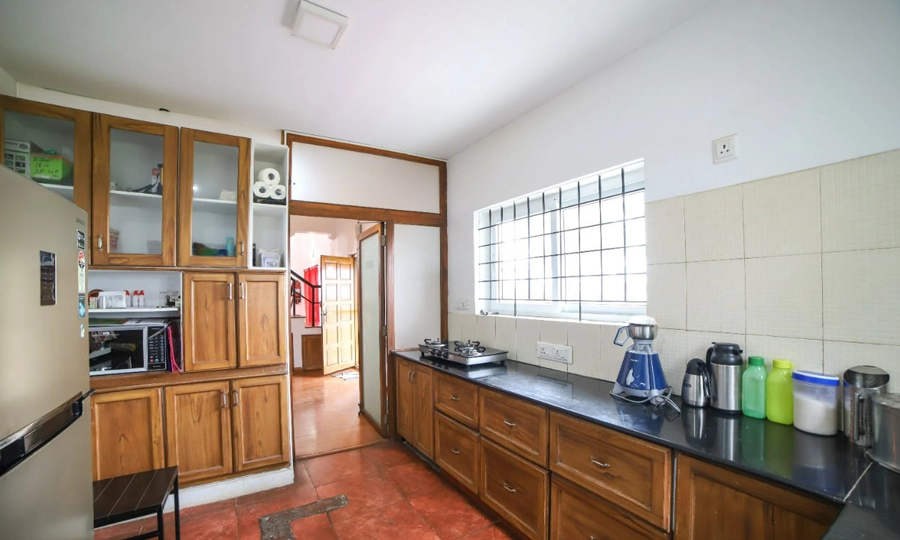 Enjoy a modern, fully equipped kitchen at Chalet Mon Ami Kotagiri for a convenient and comfortable stay.