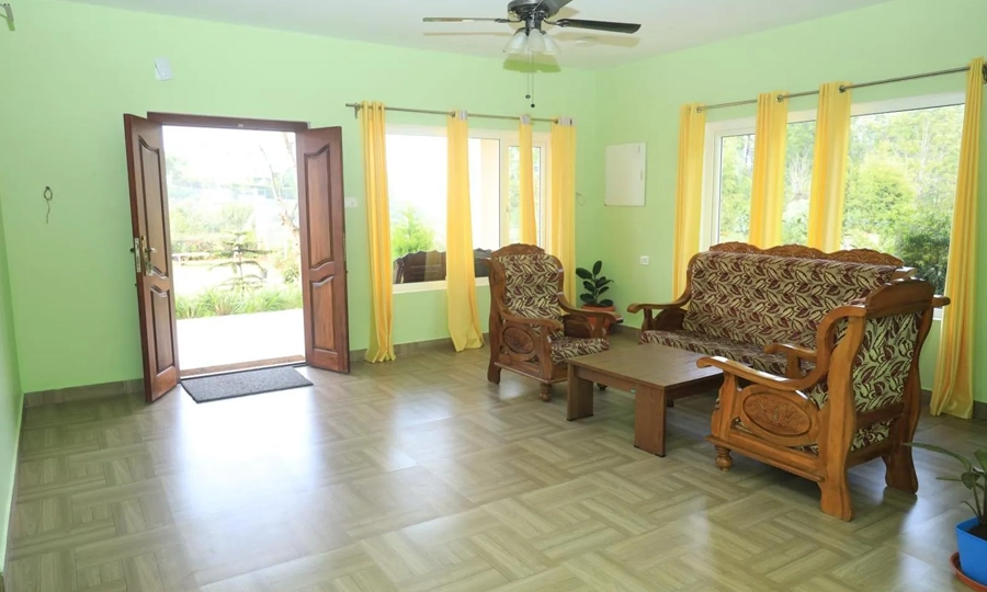 Book a luxury family villa and resort stay at De Castle Coonoor surrounded by hills and nature views