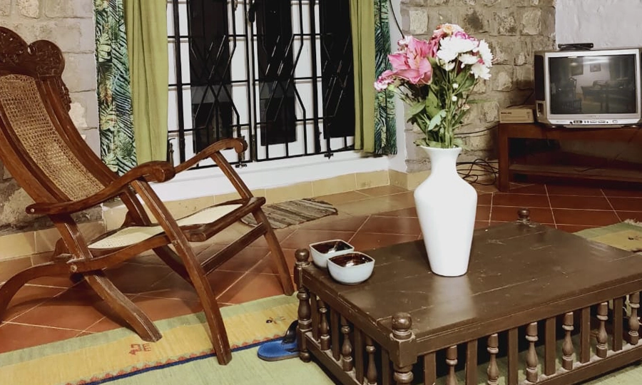Relax in the spacious hall at Rico Retreat, a scenic holiday homestay nestled in the hills of Kotagiri