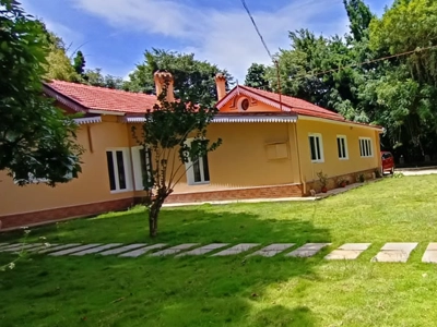 Book a stay in a restored century-old British colonial bungalow in Coonoor with heritage charm and comfort