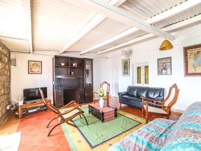 Unwind in the spacious hill-view hall at Rico Retreat Kotagiri, perfect for relaxing and group gatherings
