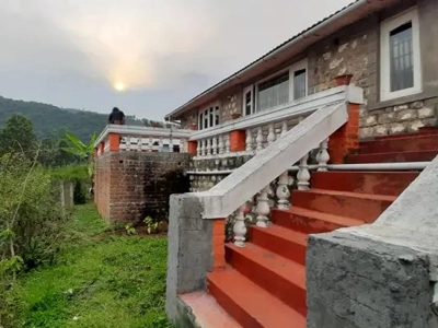 Enjoy a peaceful family holiday stay with scenic views and cozy comfort at Rico Retreat in Kotagiri hills