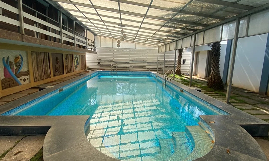 Relax by the private pool, swim under the open sky, and enjoy green surroundings at farmhouse Sulur.