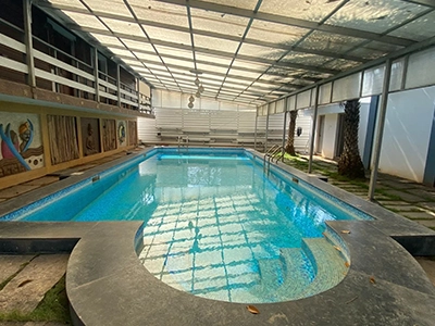 Relax by the private pool, swim under the open sky, and enjoy green surroundings at farmhouse Sulur.