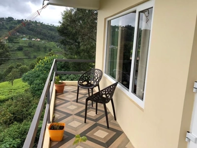 Book corporate retreat villas in Coonoor with mountain views, ideal for team getaways and meetings