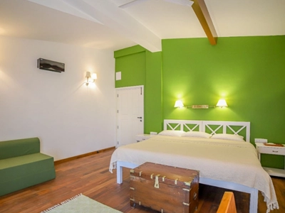 Experience a spacious and elegant luxury bedroom at a peaceful retreat in Rayne Forest,Kotagiri hills.