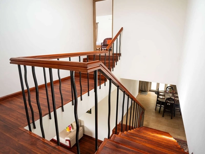 Enjoy a warm, inviting villa with stylish stairs linking cozy living and dining spaces there at Kotagiri.