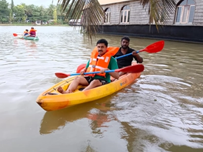 Experience a premium luxury houseboat stay in Kerala with stunning backwater views and modern comforts