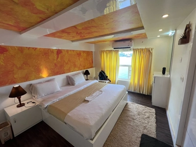 Relax in a comfortable bedroom on an Alleppey houseboat with serene views and peaceful night stay experience