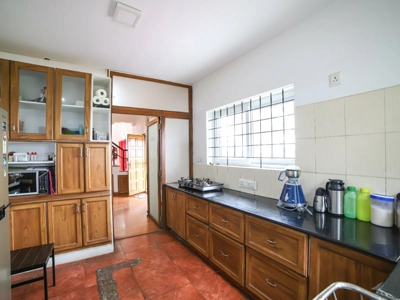 Enjoy a modern, fully equipped kitchen at Chalet Mon Ami Kotagiri for a convenient and comfortable stay.