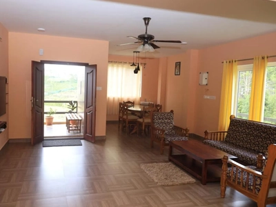 Stay at De Castle Villa in Coonoor featuring stylish wooden flooring and premium interior design